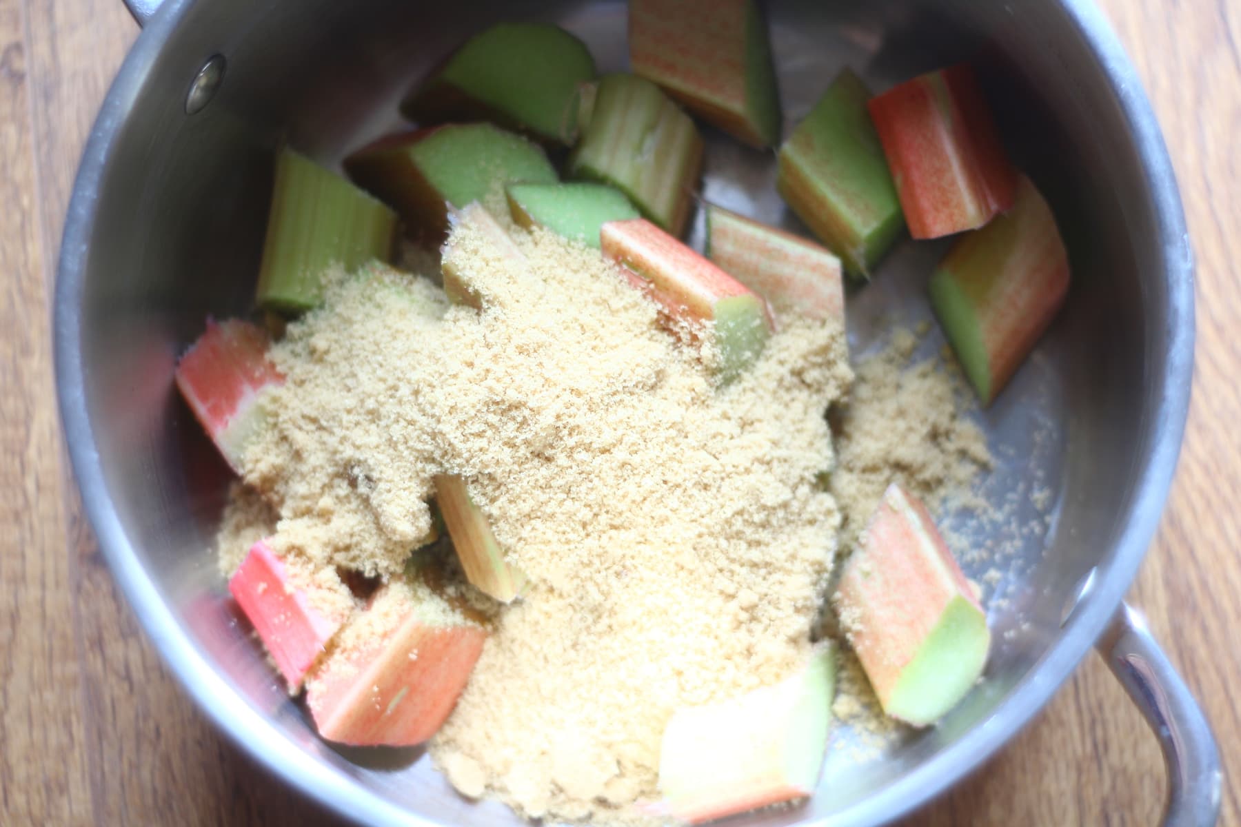 Rhubarb Rhubarb and sugar in a saucepan ready for stewing