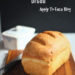 pin for wholemeal bread on a wooden board with a knife