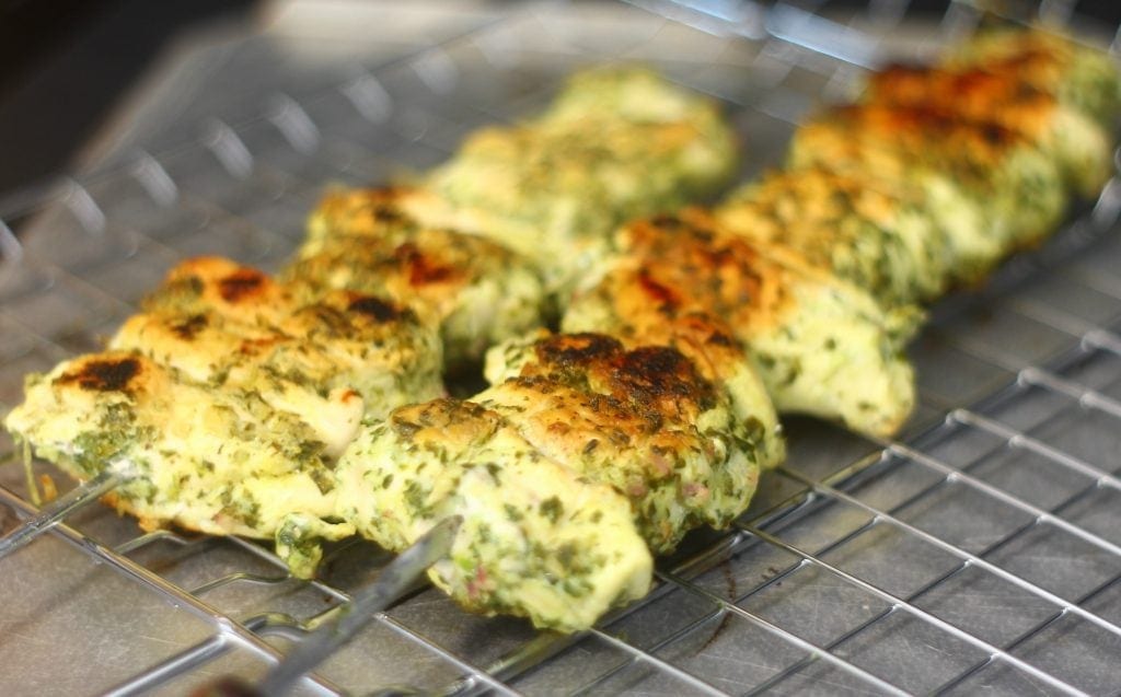 chicken kebabs on a wire rack