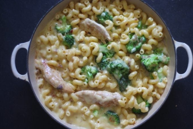 cheesy chicken and broccoli pasta in a large frying pan