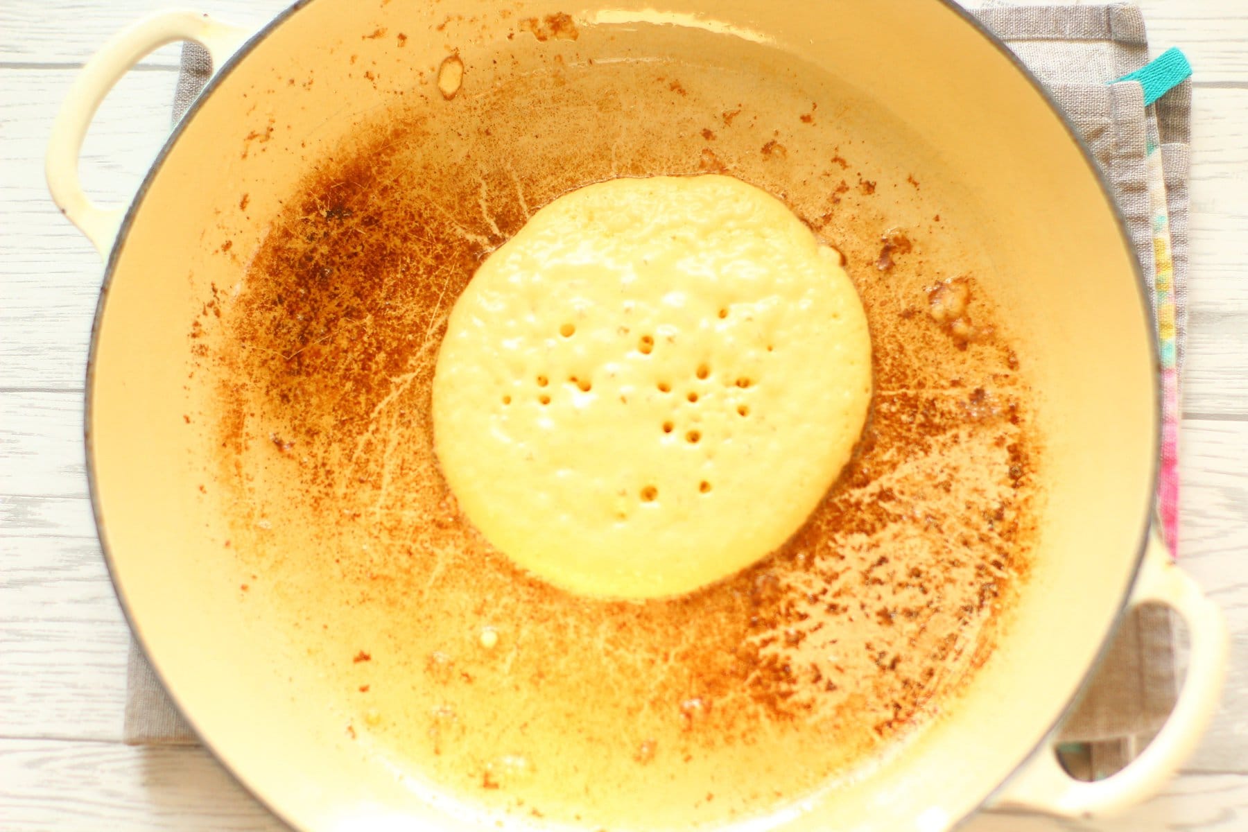 american pancakes american pancake frying in a frying pan