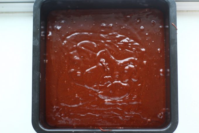chocolate brownies brownie batter in a square baking tin