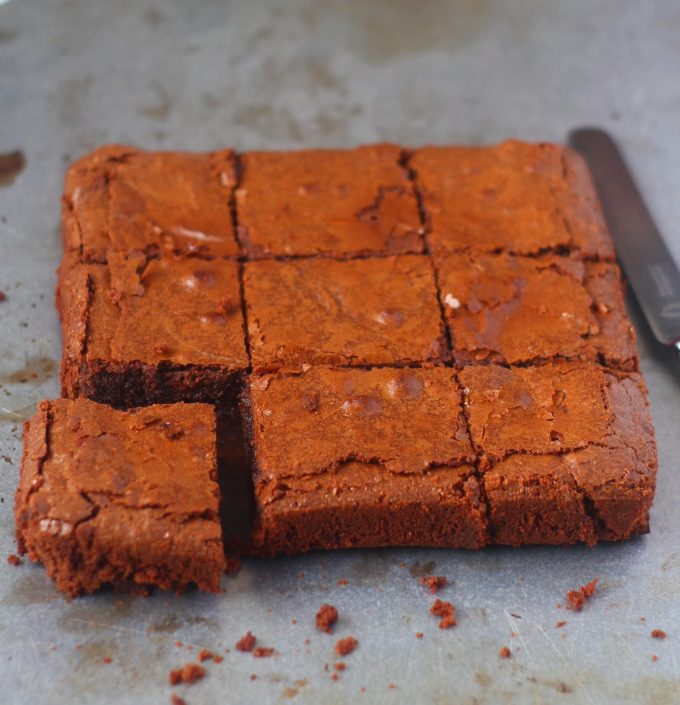 chocolate brownies on a tray sliced into squares