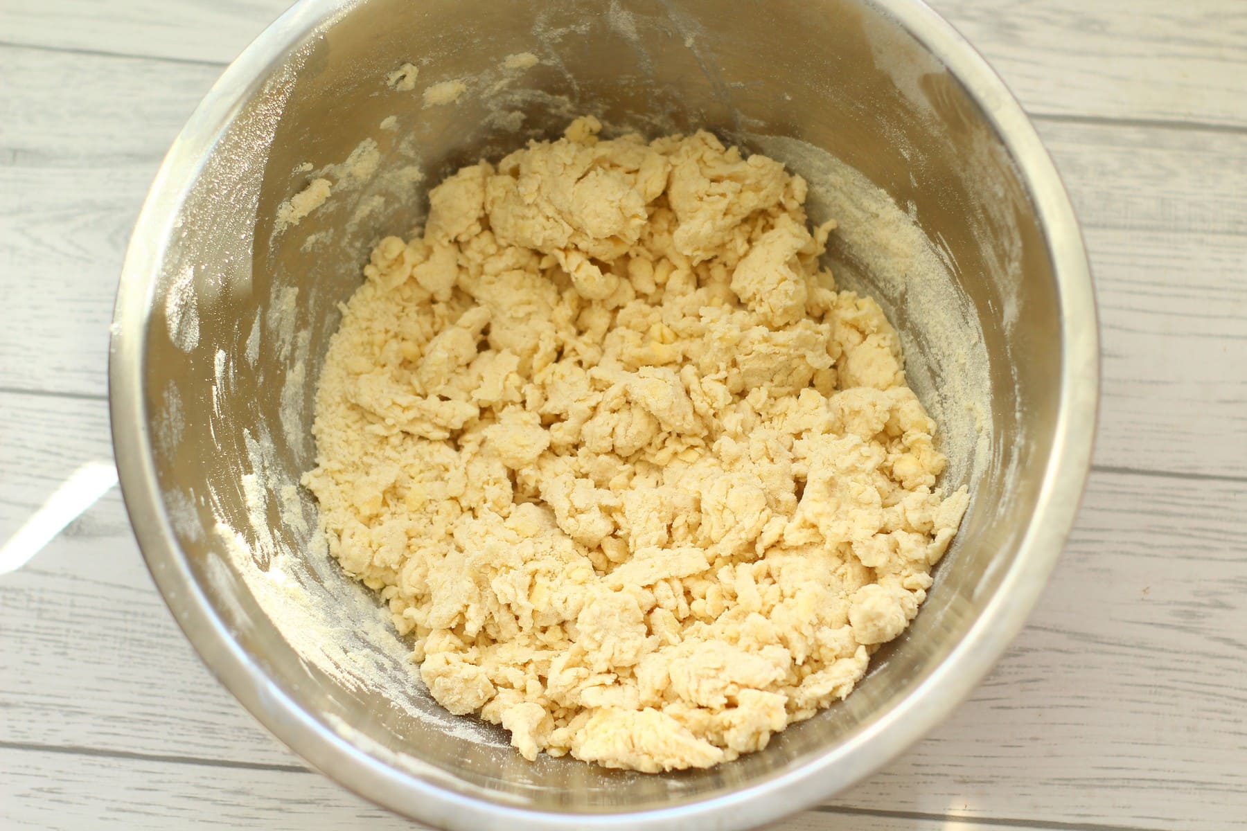 scone dough at the first mix in a bowl.