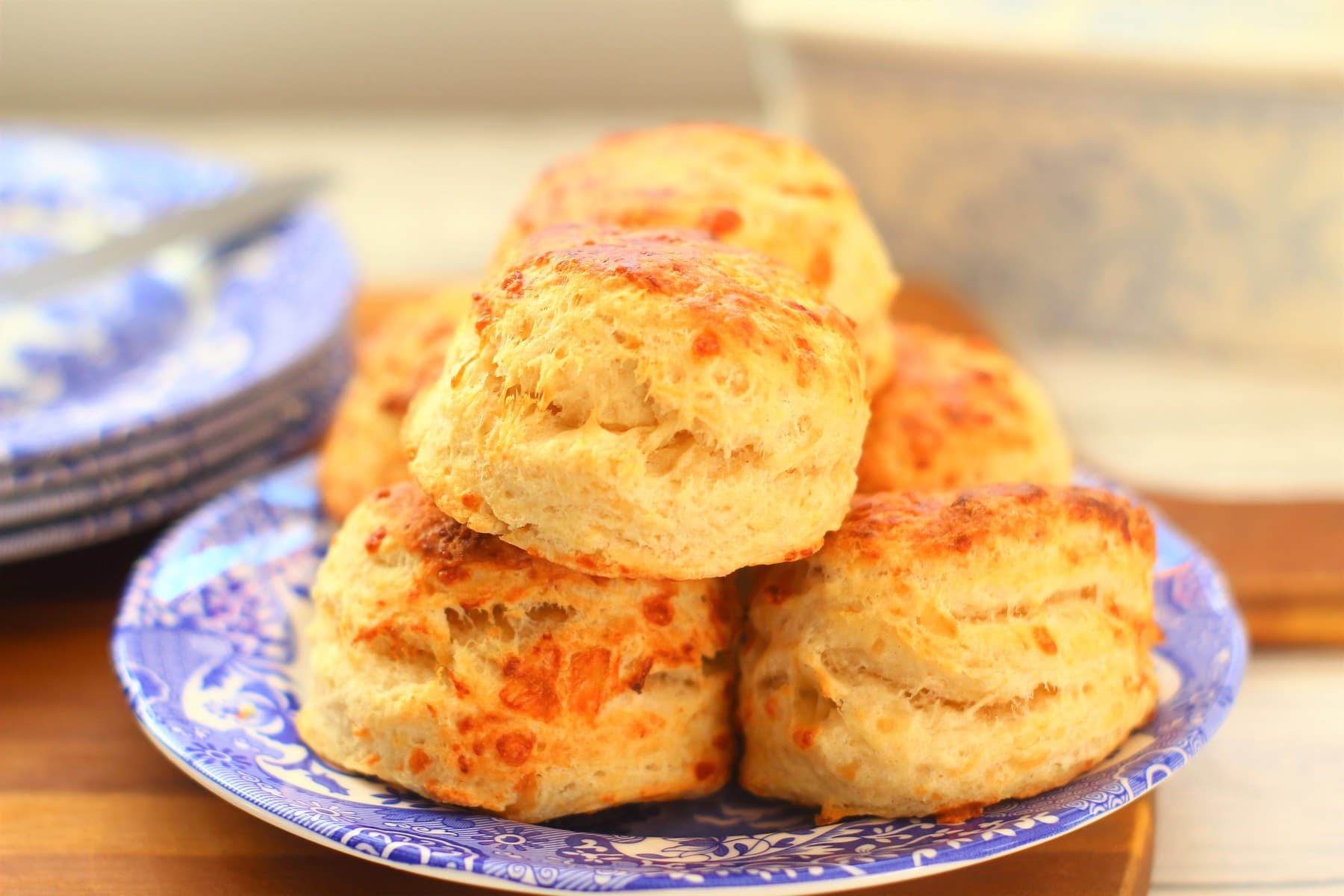 stack of cheese scones on a plate