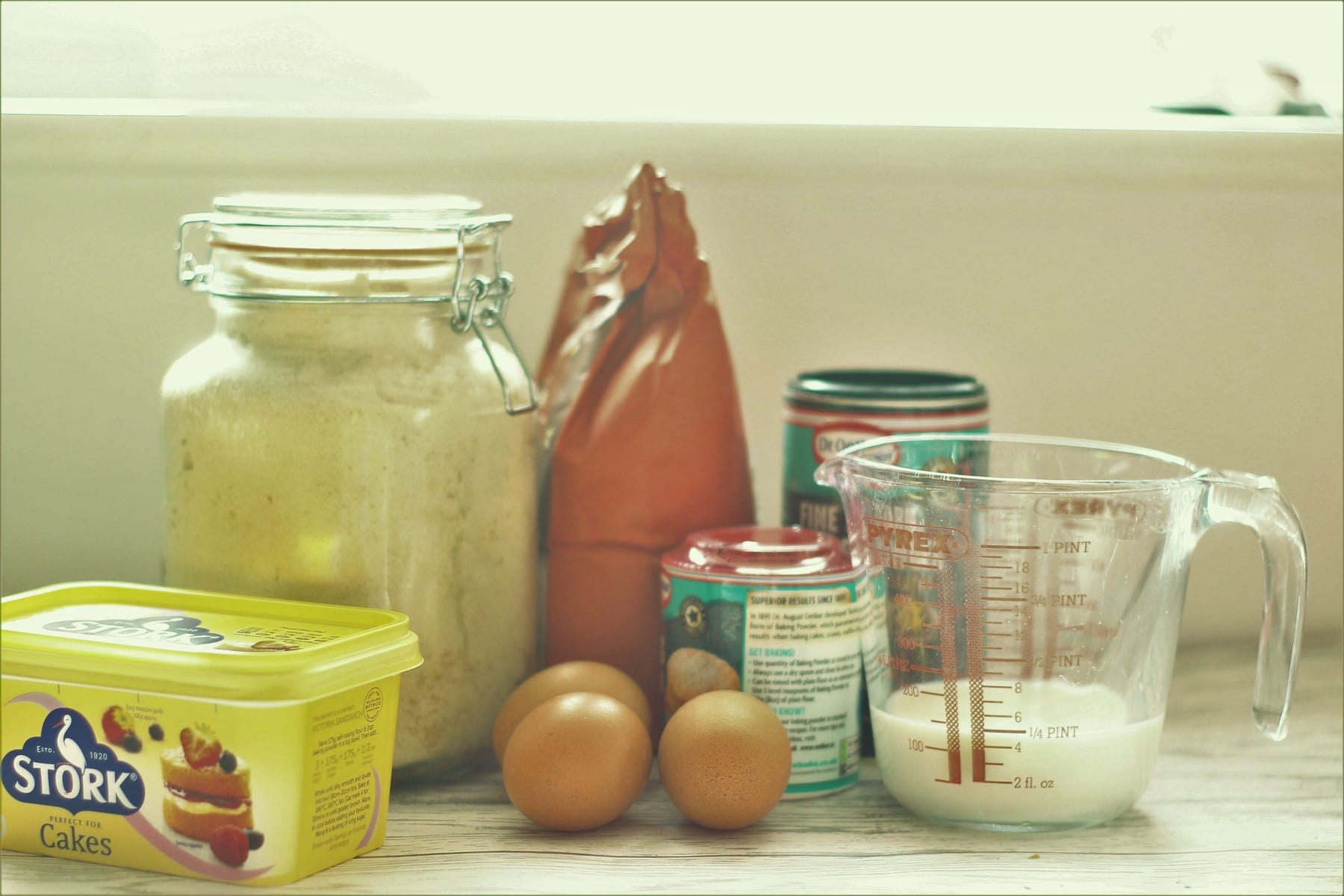 chocolate cake ingredients stork, eggs, sugar,milk, cocoa, flour and baking powder ingredients for chocolate cake