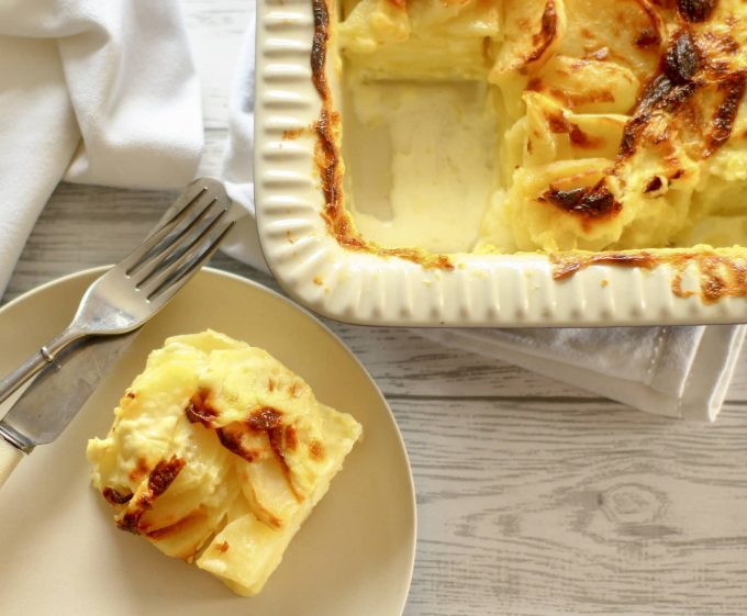 dauphinoise potatoes square on a plate