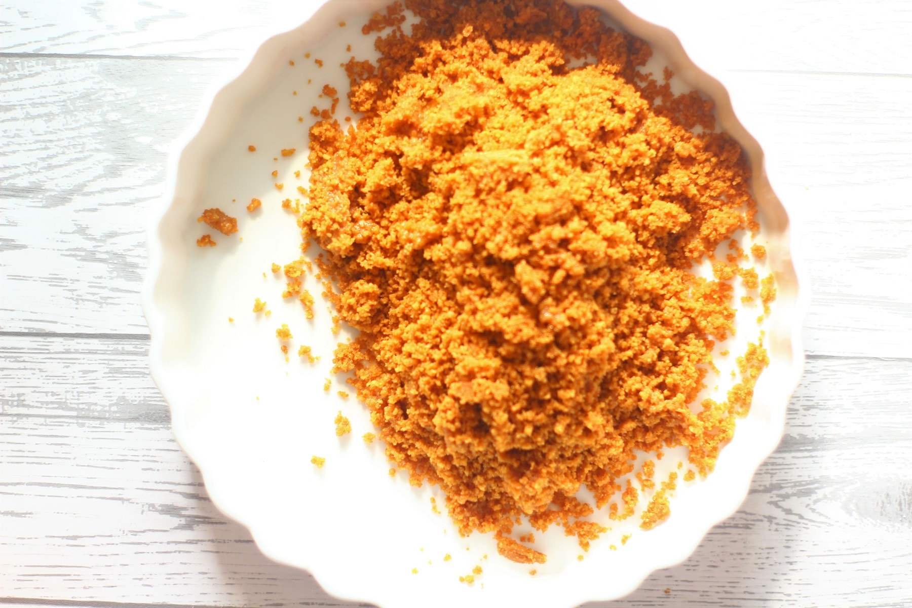 crushed ginger biscuits for the bottom of the cheesecake