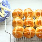 hot cross buns on a wire rack