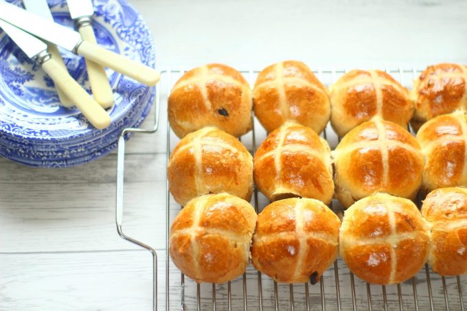 hot cross buns on a wire rack