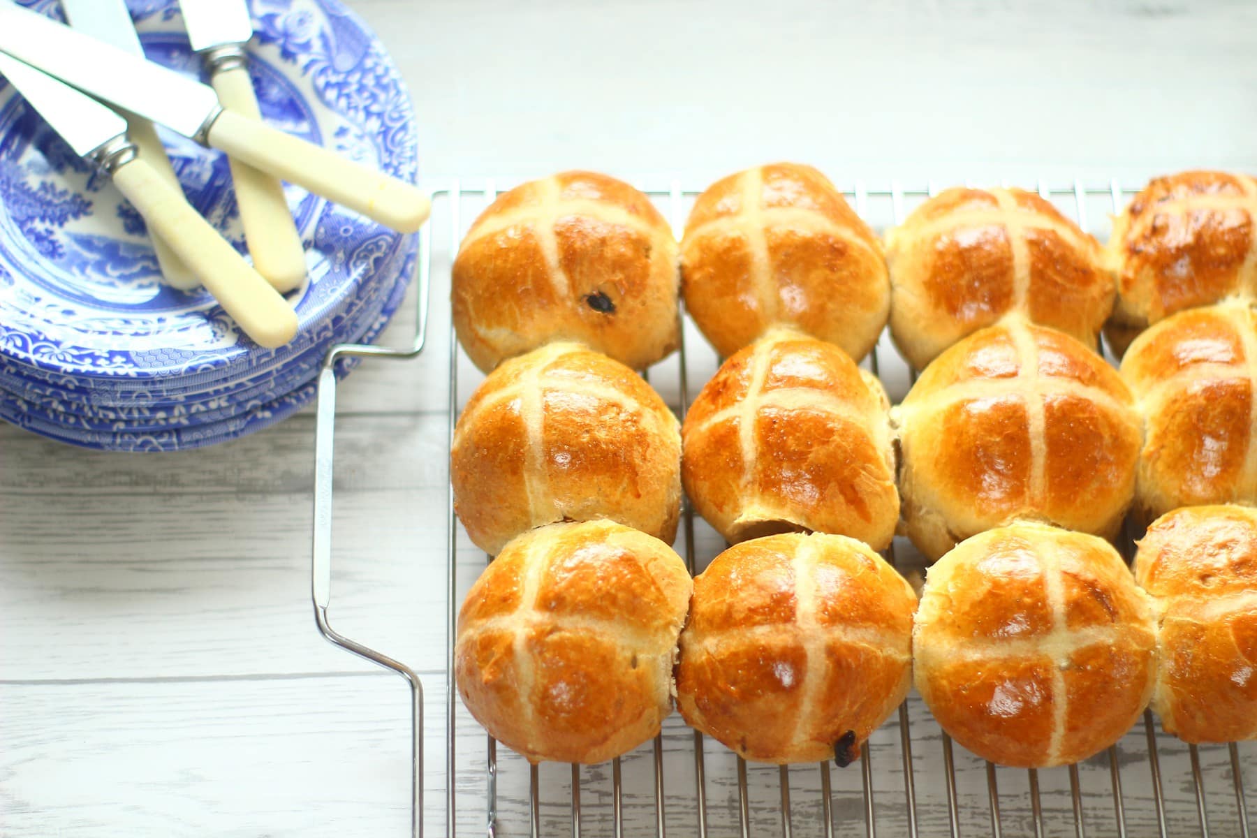 hot cross buns on a wire rack