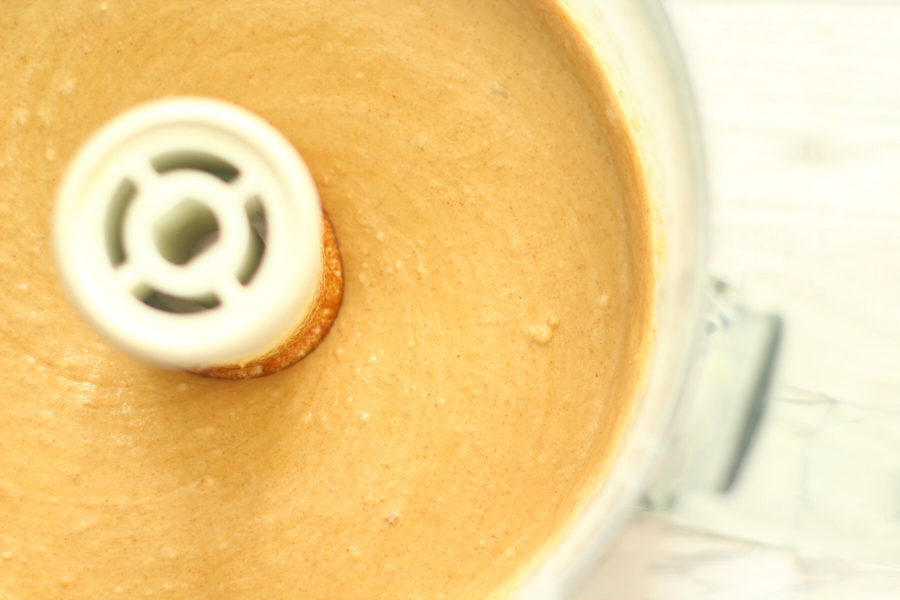 Coffee and walnut cake batter in a food processor