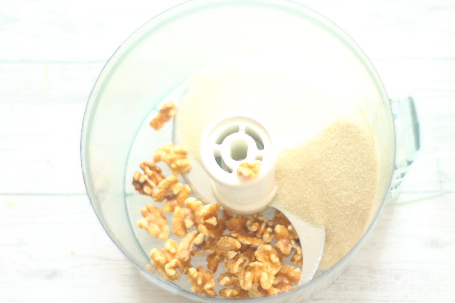 walnuts and sugar in a food processor