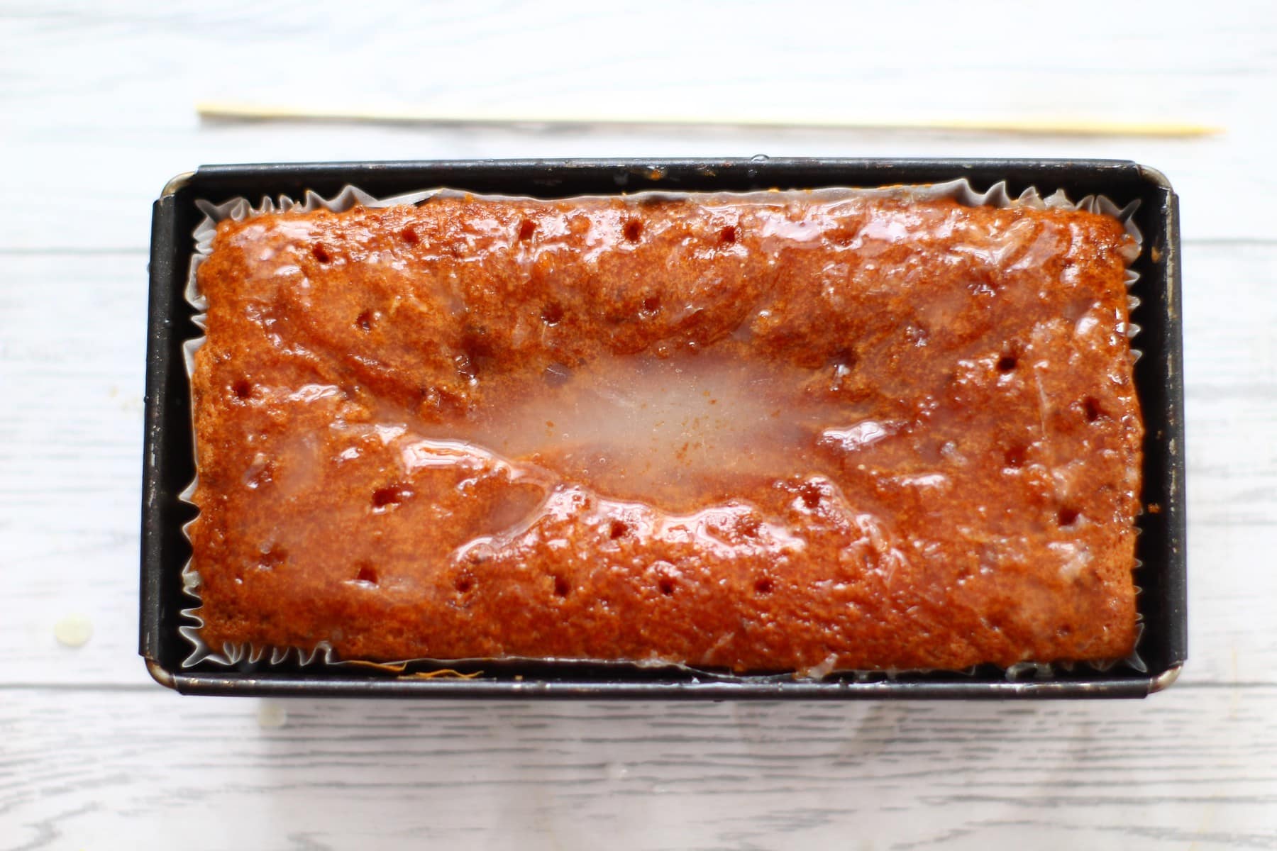 lemon drizzle cake with syrup pourd on.