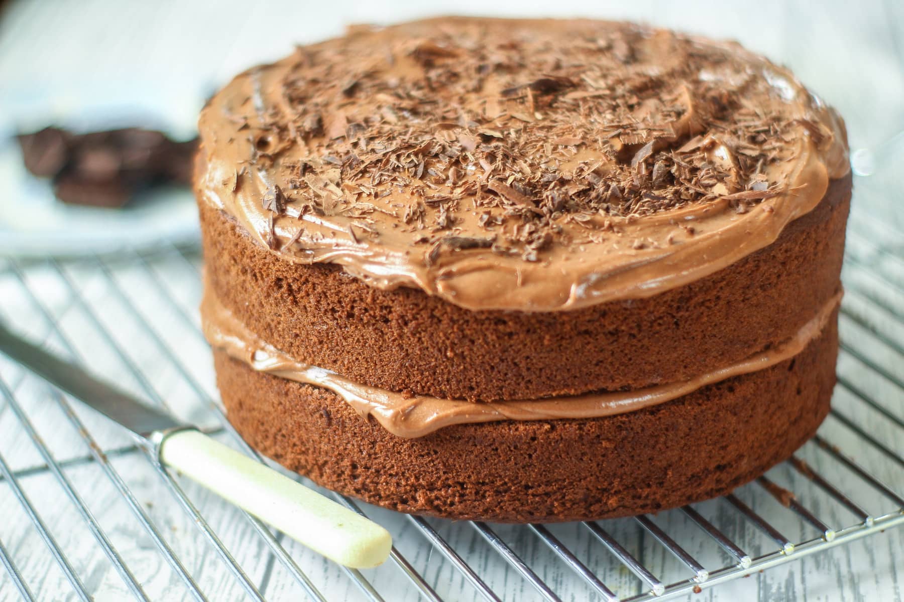 easy chocolate cake on a wire rack