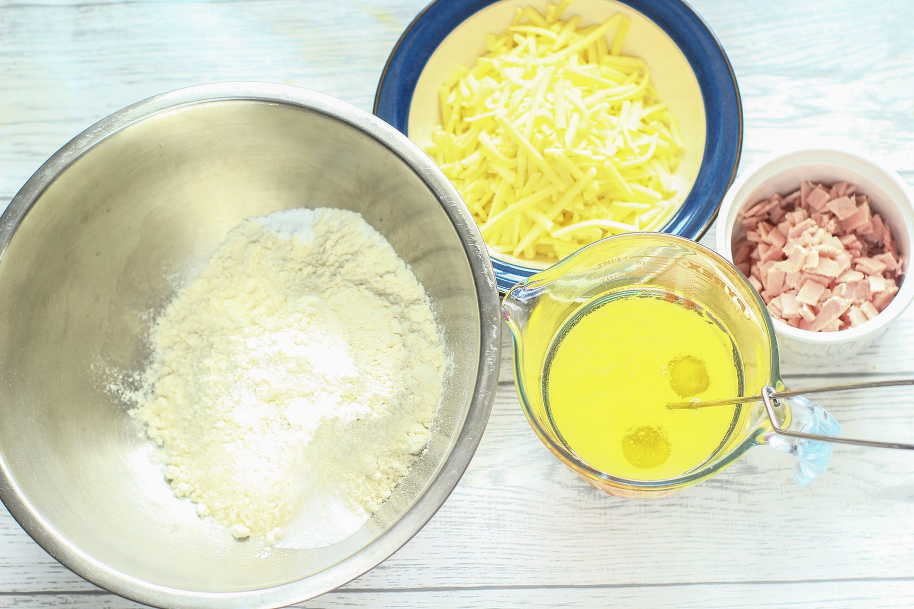 flour, ham,, cheese, baking powder, salt,eggs, oil, milk