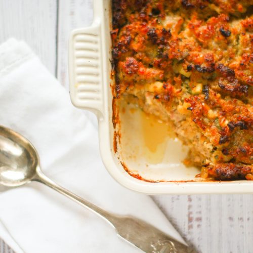 pork stuffing in a roasting dish