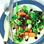 roast butternut squash salad and feta cheese on a plate