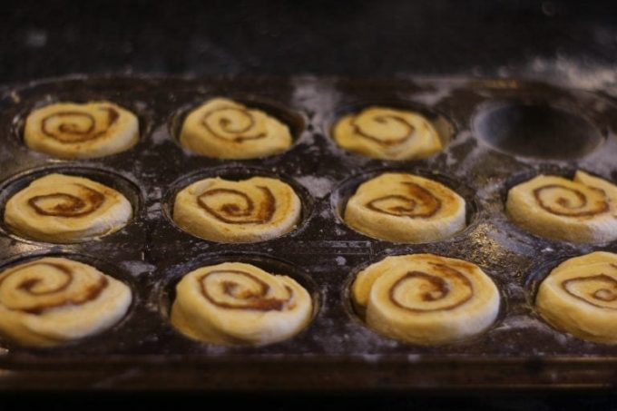 danish pastry cinnamon rolls in a muffin tray