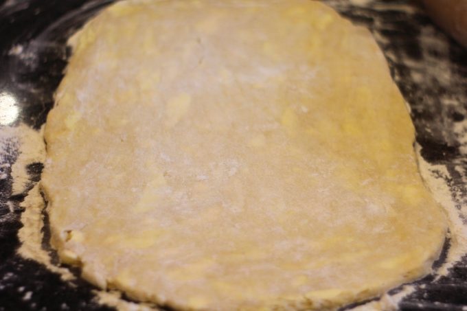 danish pastry dough rolled out on a work surface
