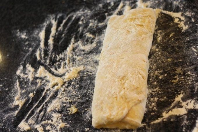 folded yum yum dough on a work surface