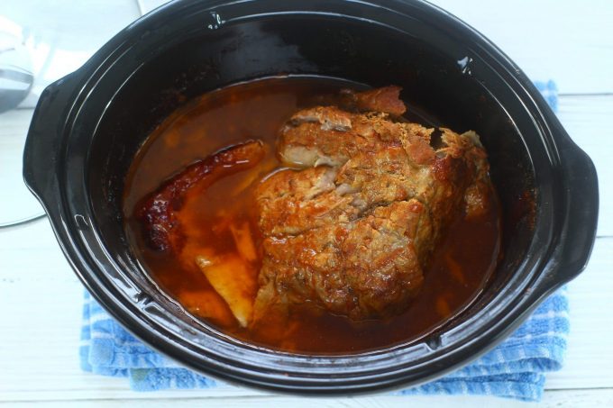 cooked shoulder of pork in the slow cooker