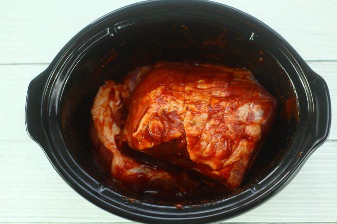 pork shoulder covered in bbq sauce