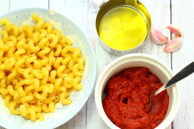 pasta, olive oil, garlic cloves and tomato puree