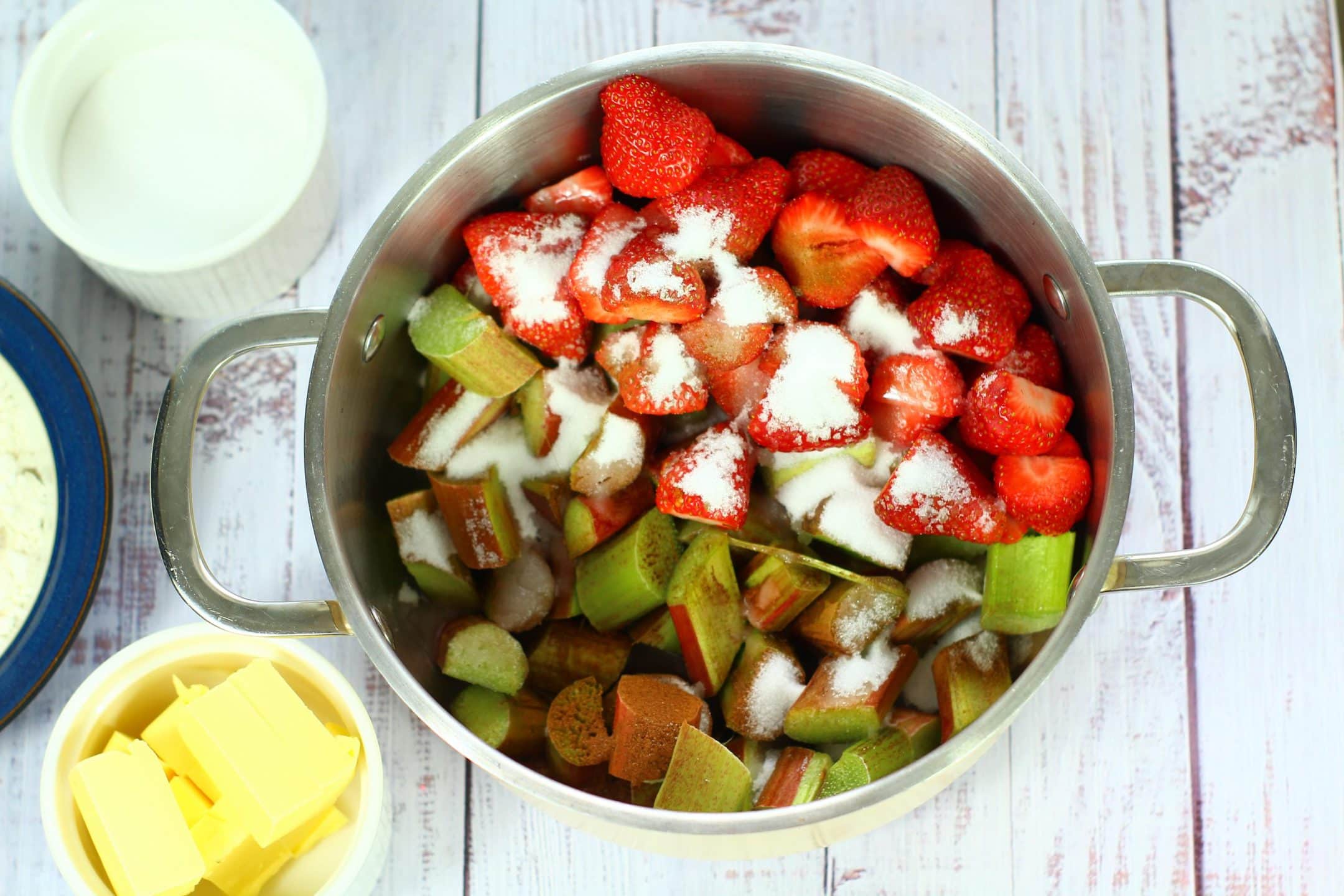 chopped rhubarb and strawberries in a saucepan