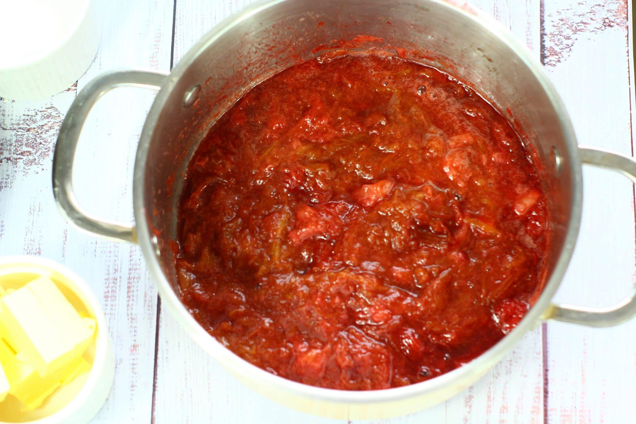 stewed rhubarb and strawberries in a saucepan