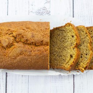 banana bread cut into slices at one end
