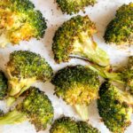 roasted broccoli with garlic on a baking tray